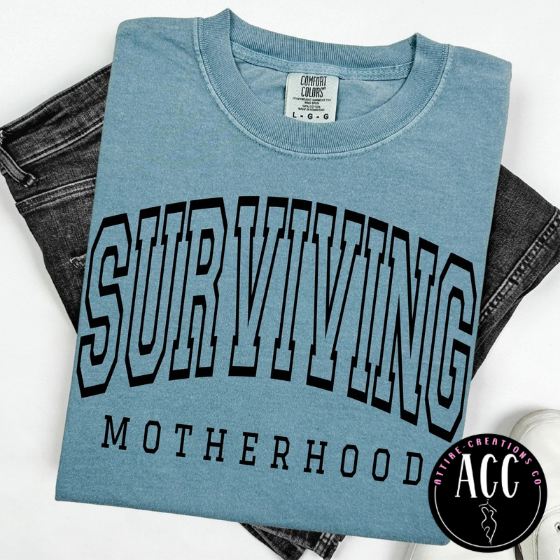 Surviving Motherhood- Funny Mom Life Tee