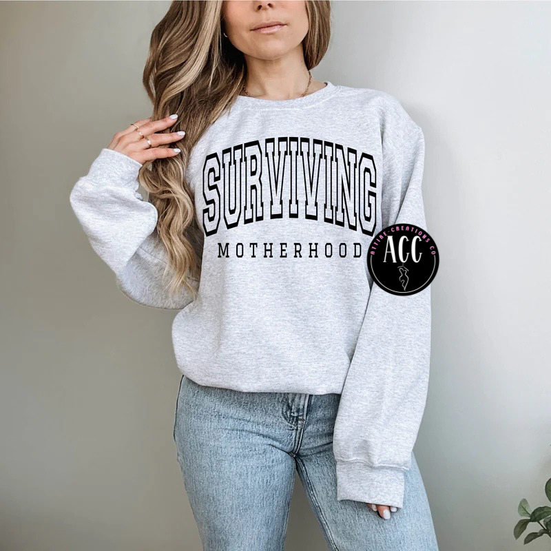 Surviving Motherhood- Funny Mom Life Tee