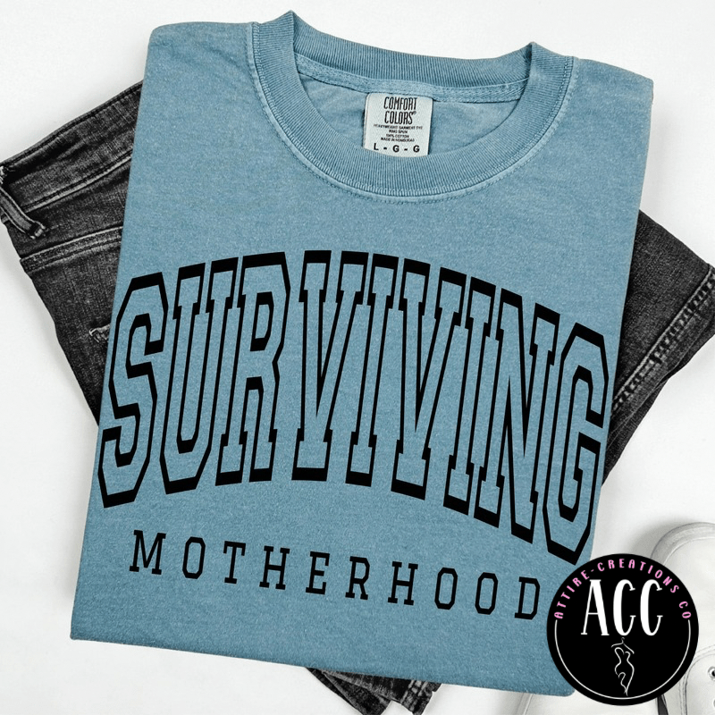Surviving Motherhood - Funny Mom Life Tee - Attire - Creations Co